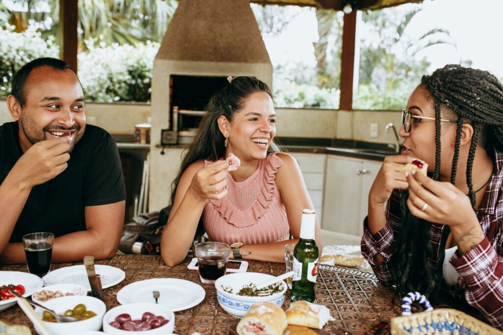 A family eating and choosing to smile
