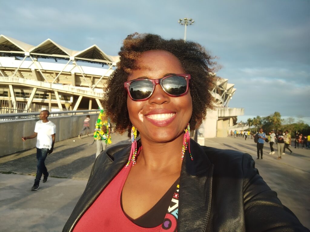 Sarah enjoying one of the unique things to do in Dar es Salaam, Tanzania, at the Benjamin Mkapa Stadium.
