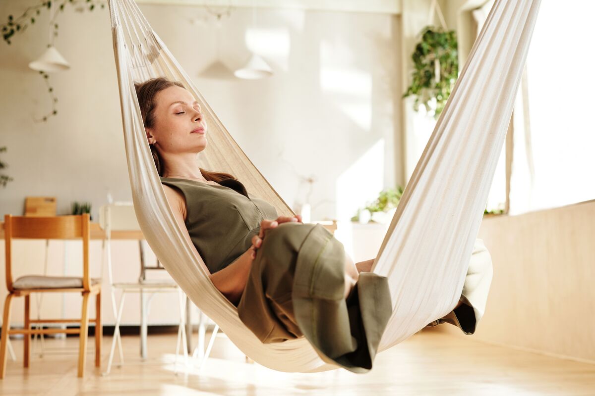 A woman resting in a hammock, reflecting on the one thing needful in life.
